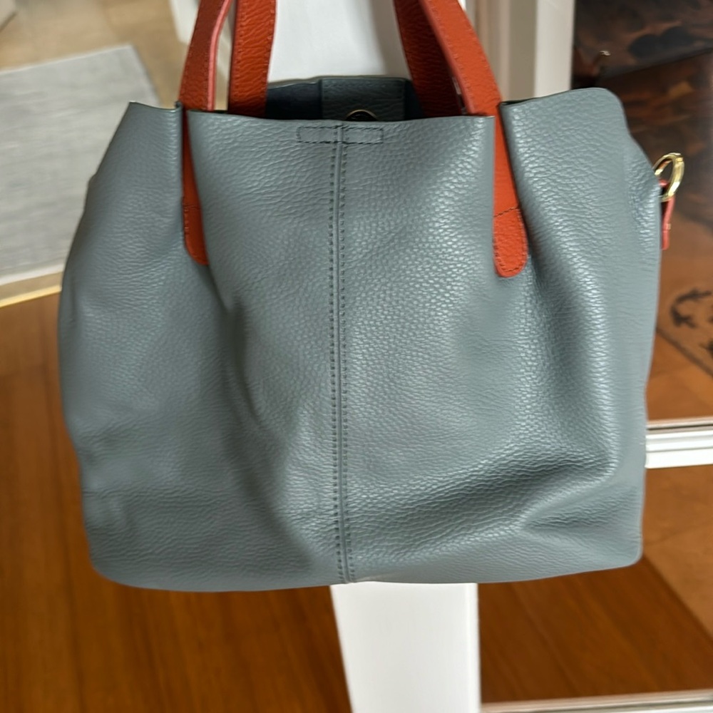 Blue leather satchel.